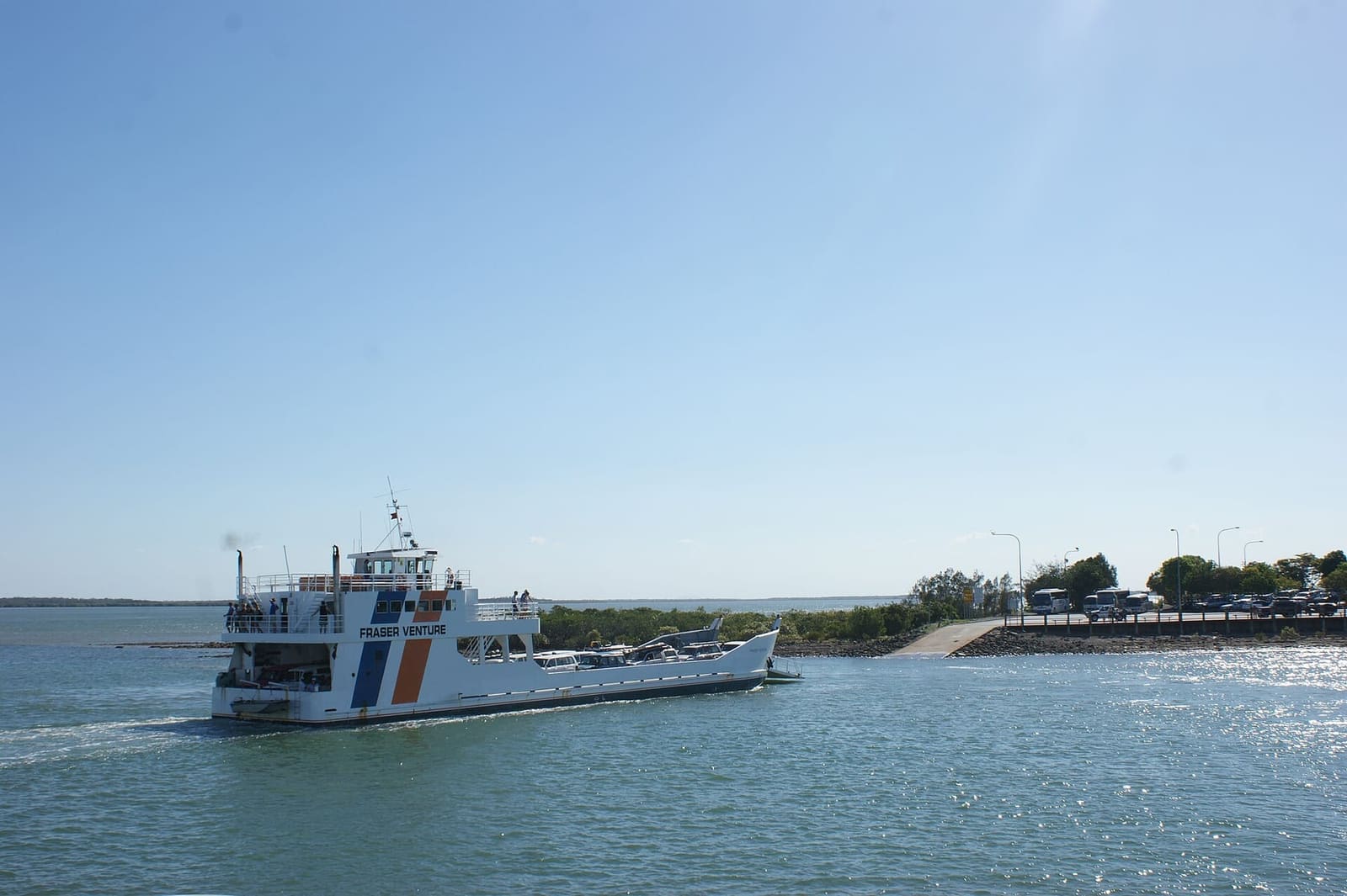 A vehicle ferry underway near River Heads